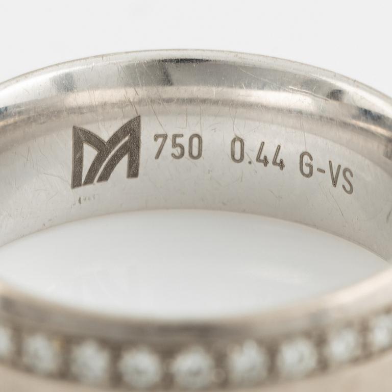 White gold and brilliant cut diamond ring.