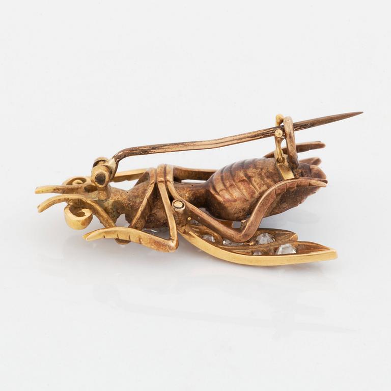 An 18K gold and opal brooch set with rose- and old-cut diamonds.
