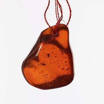 A polished piece of amber, Qing dynasty (1644-1912).