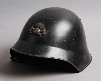 BRANDMANSHJÄLM, Schweiz, 1900-tal.