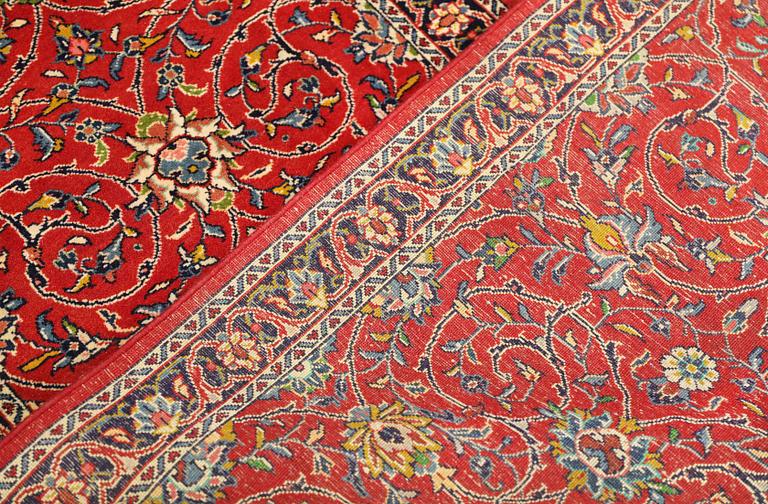 A Sarouk runner, c. 425 x 79 cm.