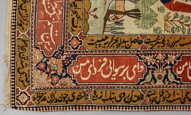 A RUG, a semi-antique Kashan figural, possibly Motachem, ca 202 x 140 cm.