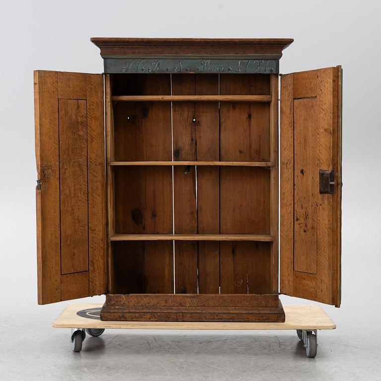A Swedish painted cabinet,  marked 1797.