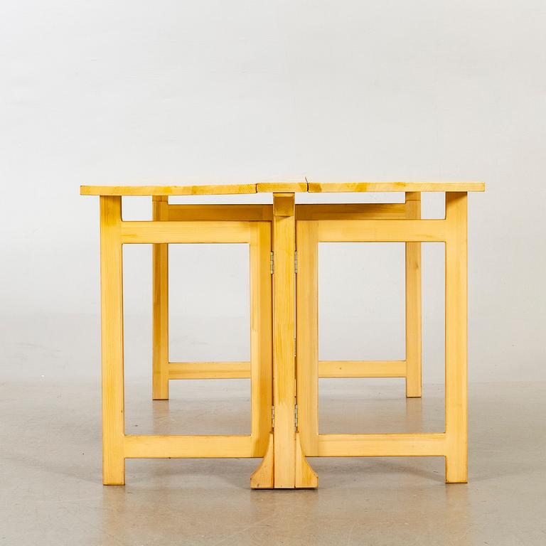 A pine wood gated leg table, design by Olof Pira "Sold Form".