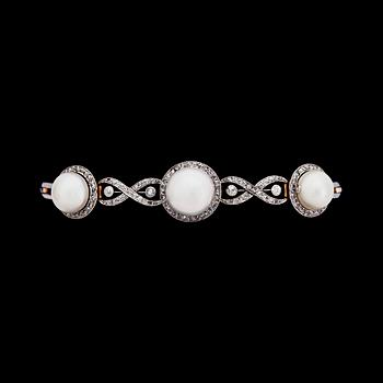 879. A diamond and natural bouton pearl bracelet, 1930's.