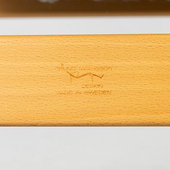 Bruno Mathsson, a 'Miranda' armchair and ottoman, Bruno Mathsson International, Värnamo, 2001.