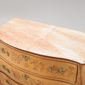 A Louis XV-style chest of drawers, Italy, probably. 19th Century.