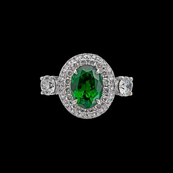 1033. A tsavorite,2.05 cts, and brilliant cut diamond ring, tot. 1.23 cts.