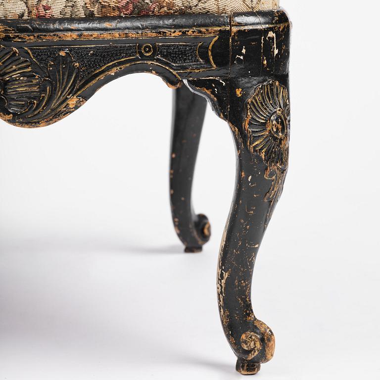 A pair of rococo armchairs in the manner of C. M. Sandberg, later part 18th century.