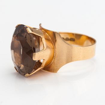 A 14K gold ring with a smoaky quartz. Nummilan Koru, Turku 1966.
