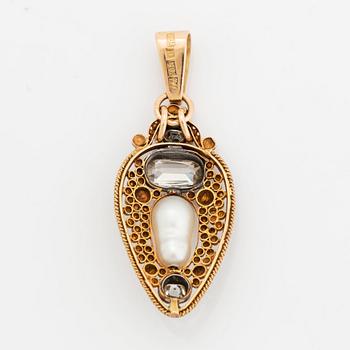 An 18K gold and silver pendant set with old-cut diamonds and a pearl, most likely natural.
