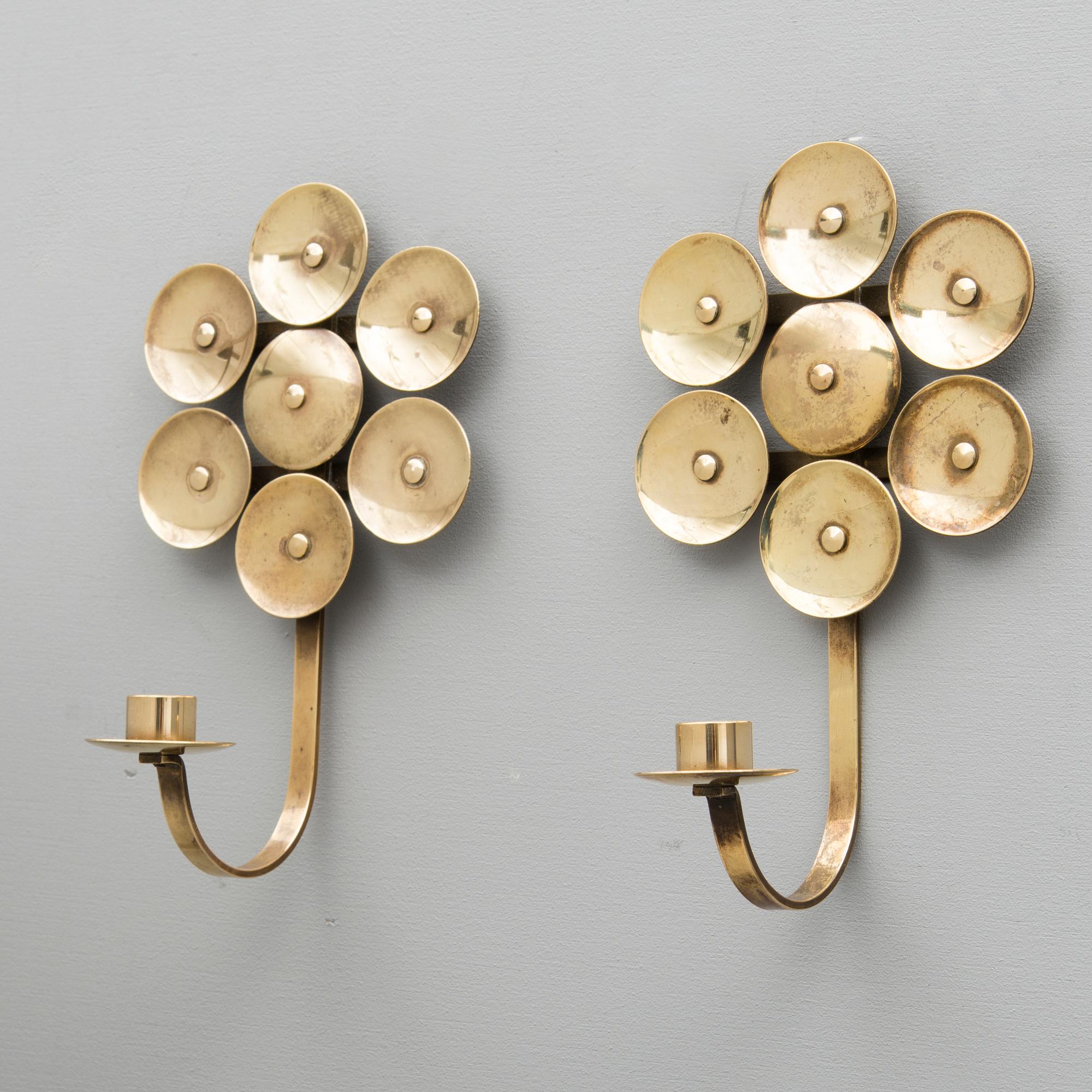 A Pair of Mid Century Swedish Brass Candle Holders by Mora KEE.
