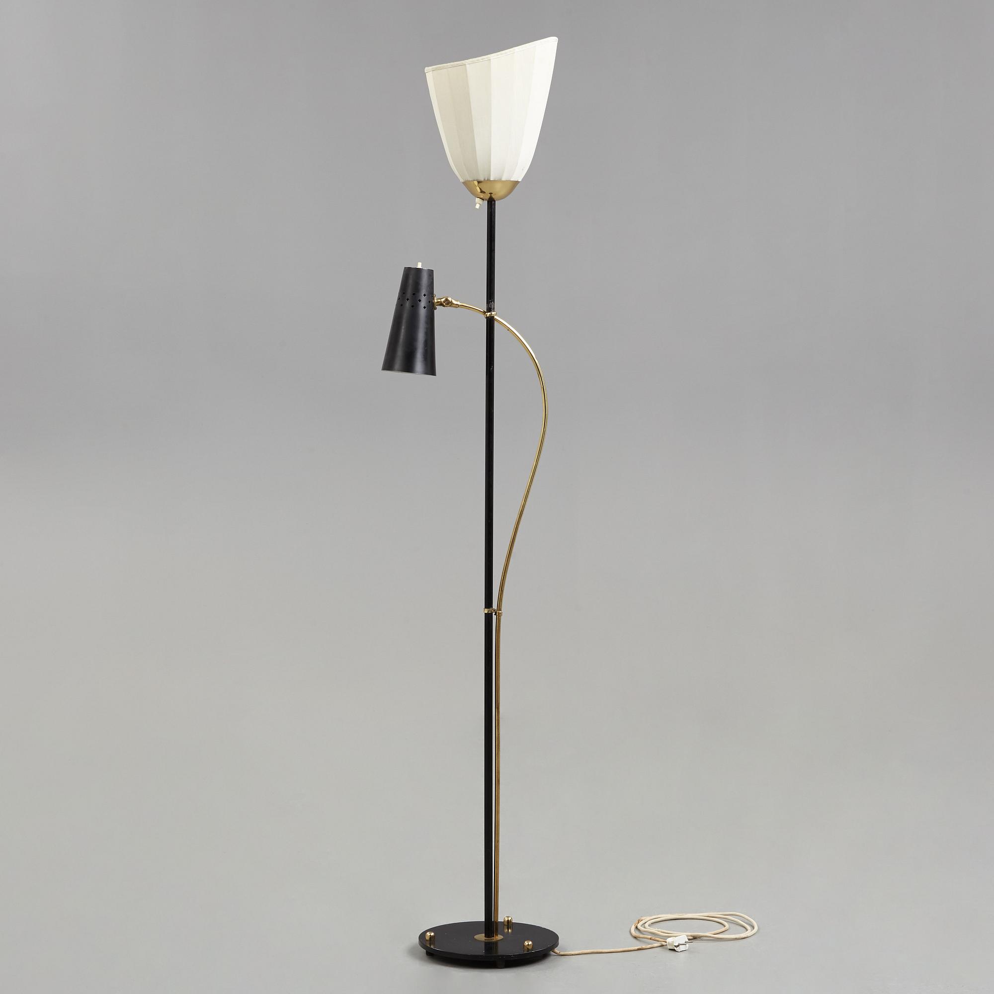 A Swedish Modern brass and black lacquered floor lamp, 1950's.
