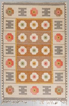 A flat weave signed AW, around the mid 20th century, 200 x 138 cm.