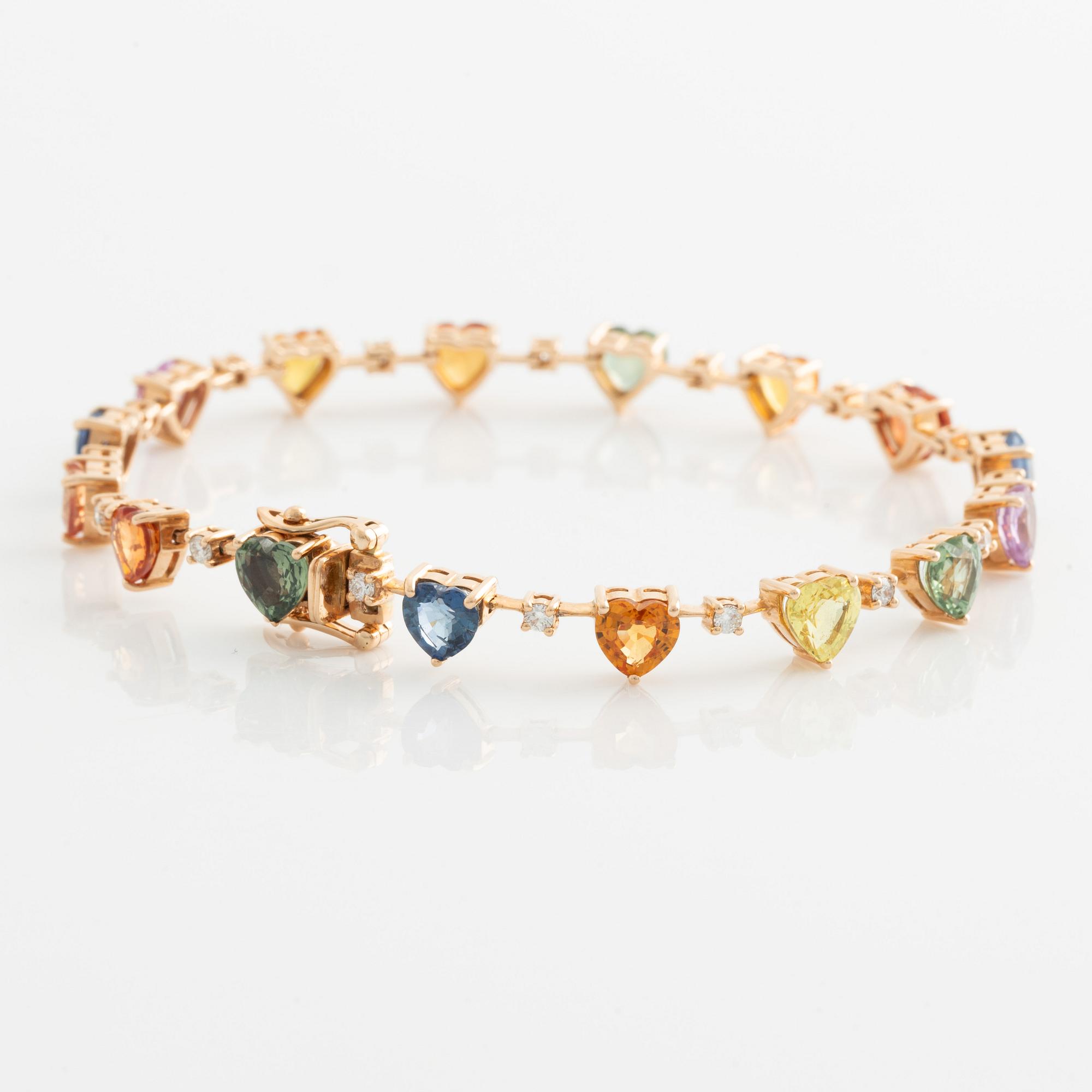 Bracelet with heart-shaped multicolored sapphires and brilliant-cut diamonds.