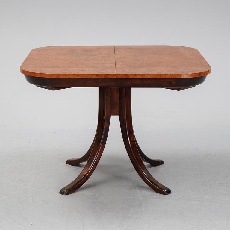 Axel Einar Hjorth, A root veneered dining table, Nordiska Kompaniet, 1938.