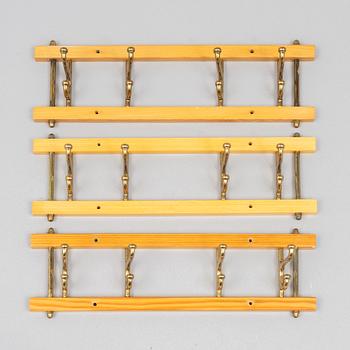A set of three 'Dekorativ' coat hangers, Skoglunds metallgjuteri, Anderstorp, 1950s/60s.