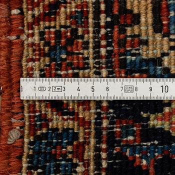 A CARPET, a semi-antique Heriz, ca 356,5-358,5 x 264 cm.