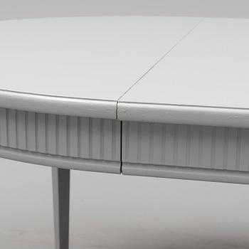 A Gustavian style dining table, mid 20th Century.