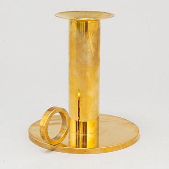 SIGURD PERSSON, a brass candleholder.