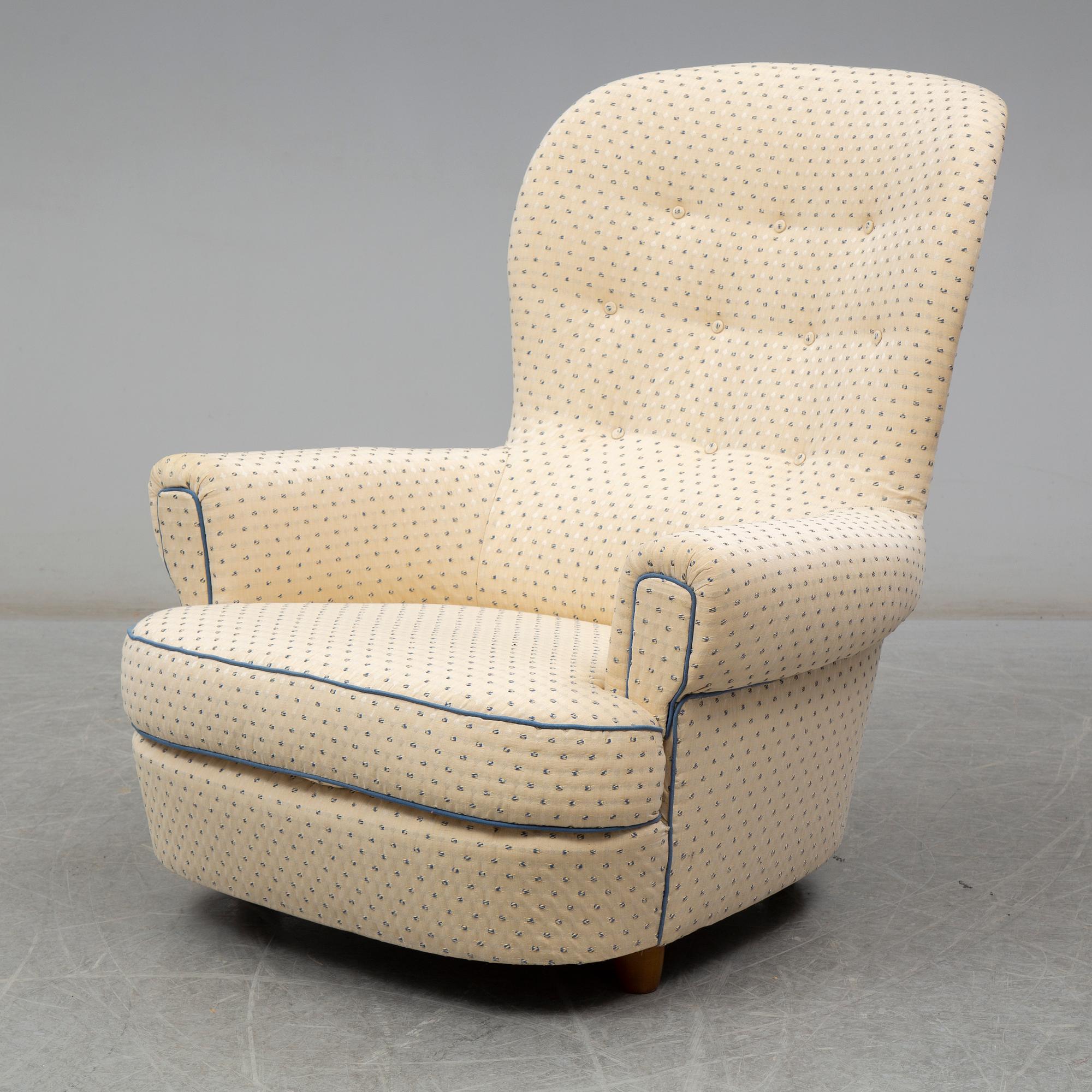 A Carl Malmsten "Jättepaddan" armchair, late 20th or early 21th century.