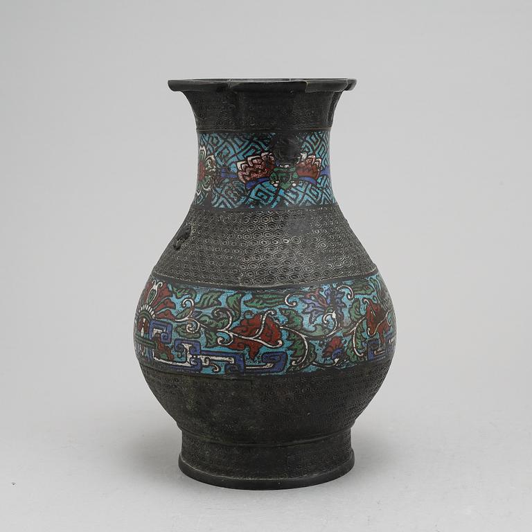 A Chinese bronze and cloisonné vase, around the year 1900.