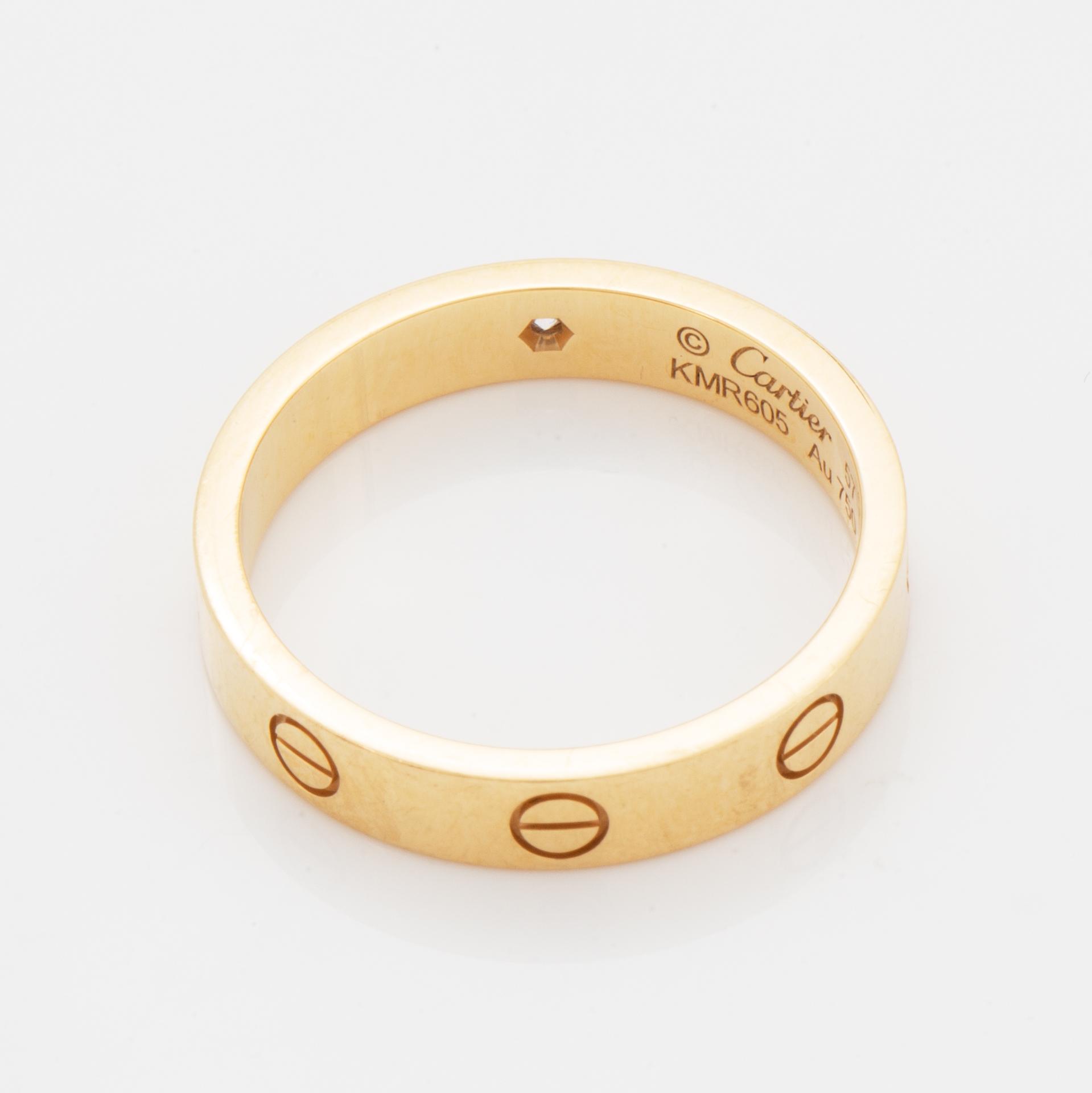 Cartier ring "Love" 18K guld med en rund briljantslipad diamant.