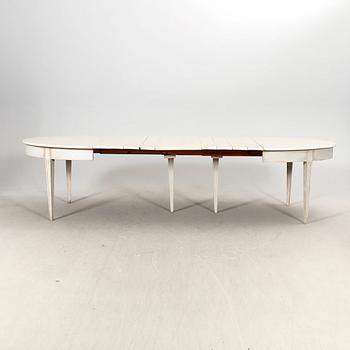 A painted 19th/20th Gustavian style dining table.