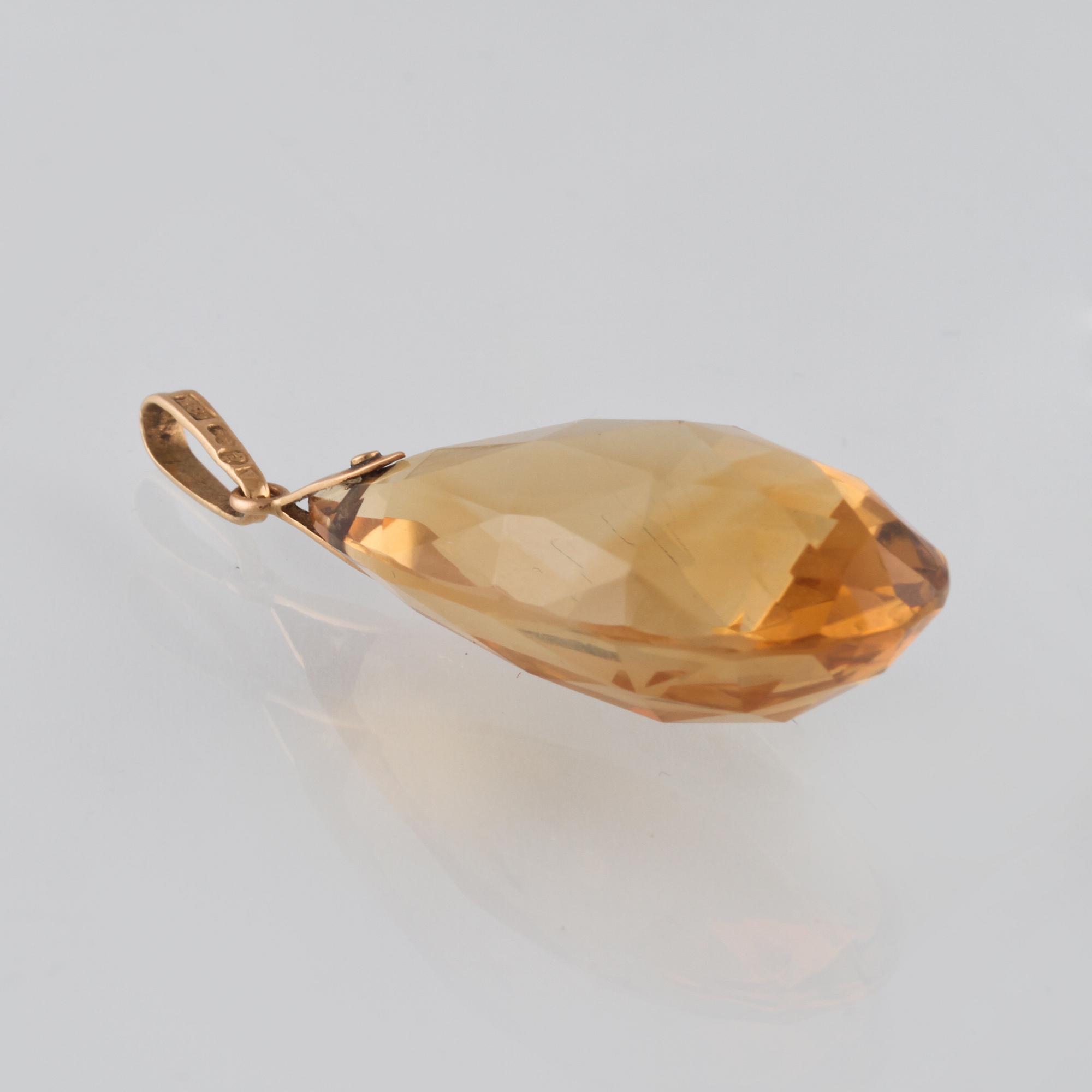 HÄNGE, 18K guld med briolettslipad citrin, Göteborg 1930. Vikt 5,8 gram.