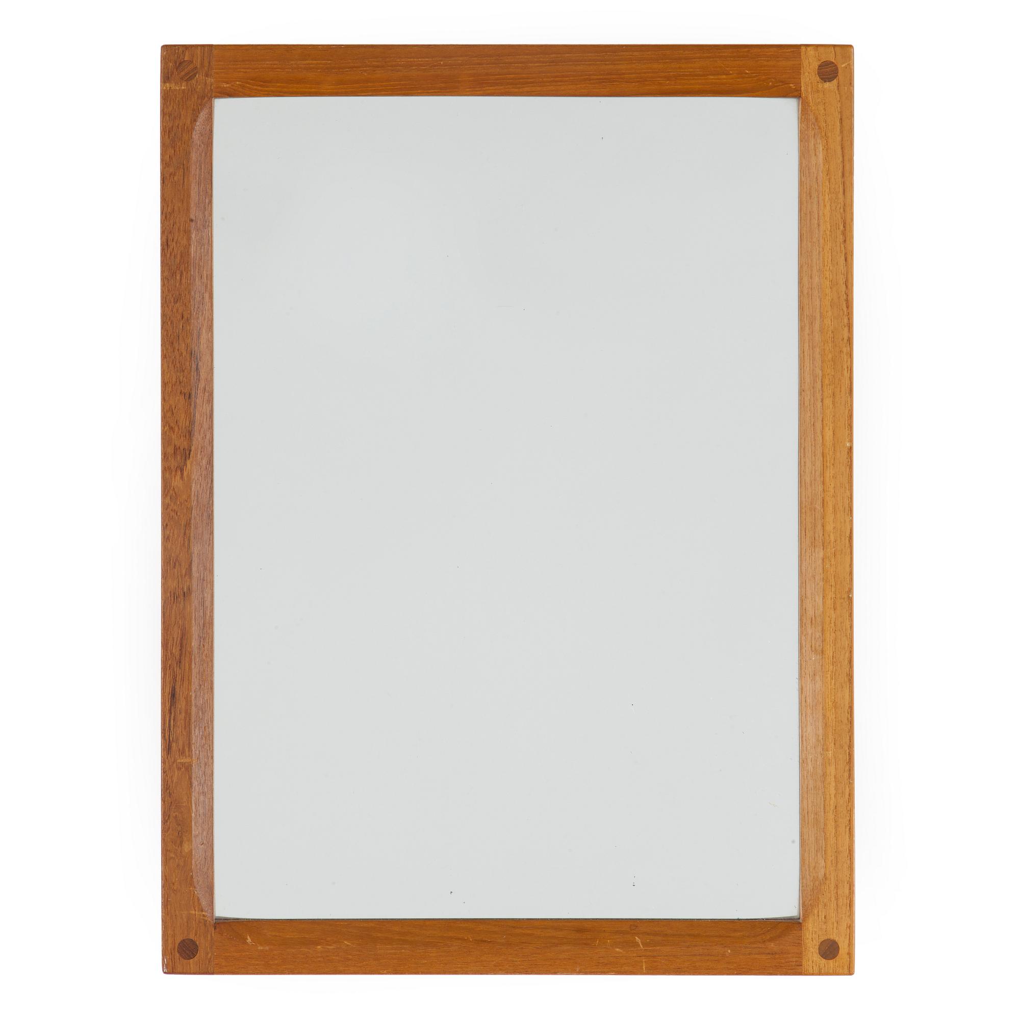 A teak mirror by Aksel Kjersgaard, Odder, Denmark.