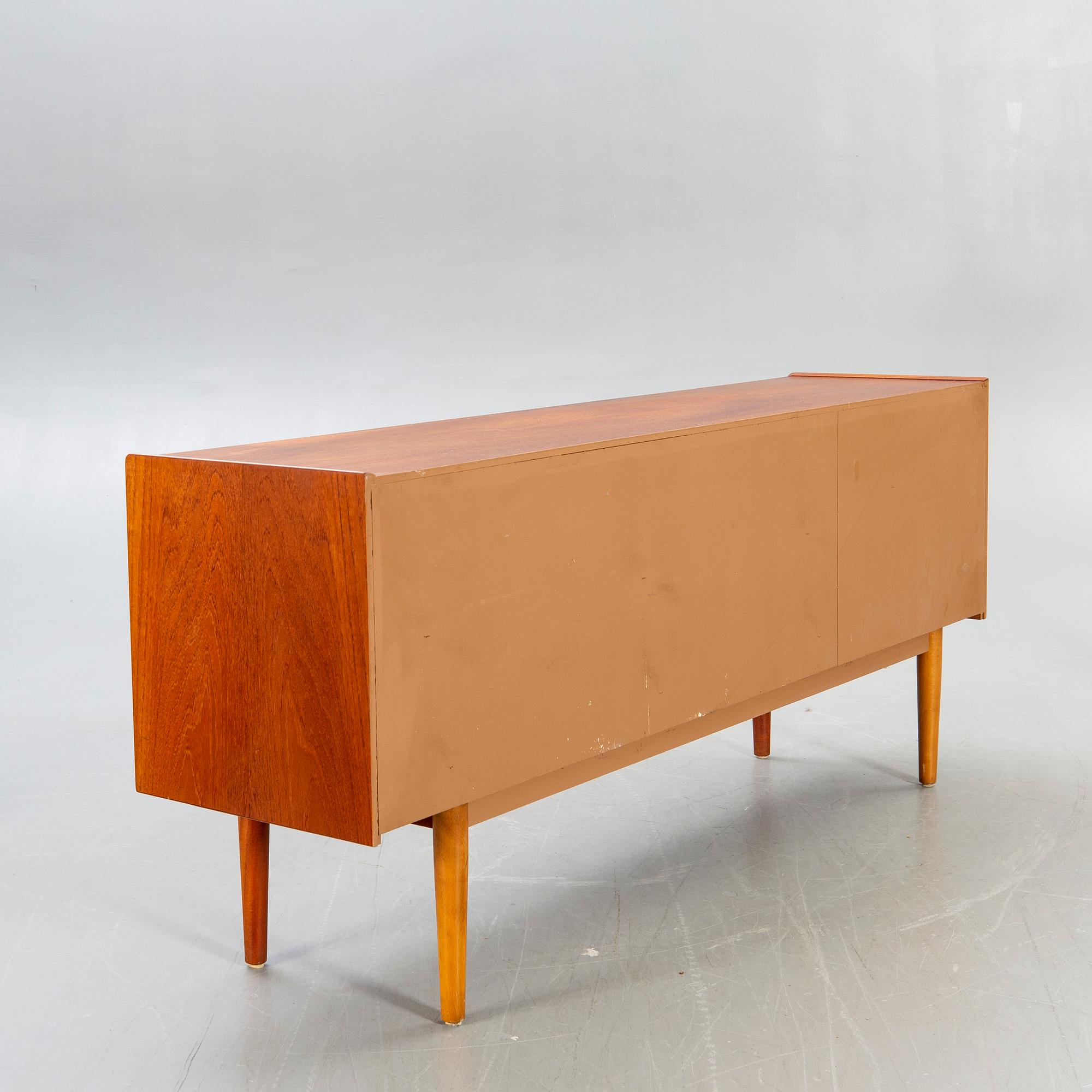 Nils Jonsson, a trio teak sideboard from Troeds later part of the 20th century.