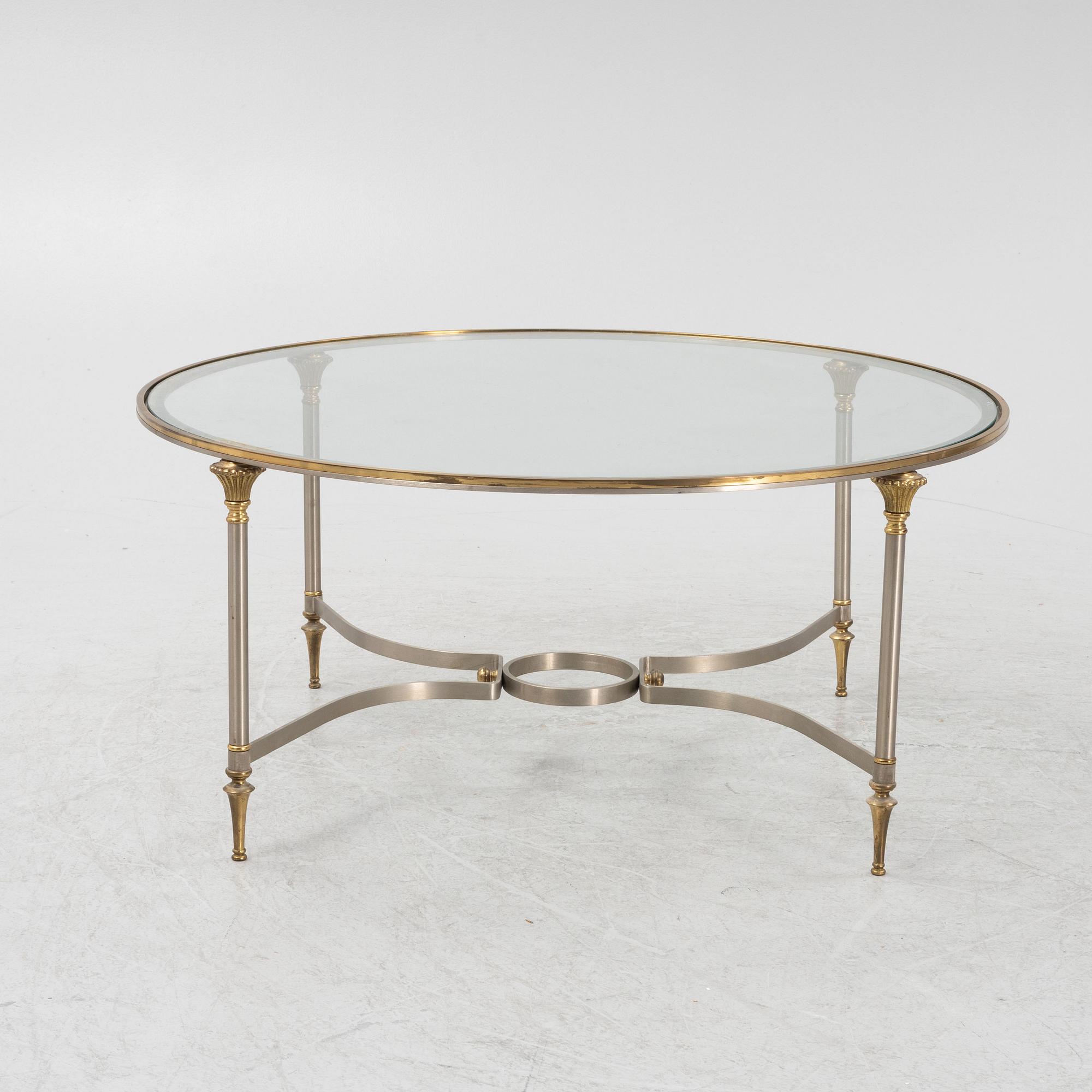 A steel and glass coffee table, Nordiska Kompaniet, end of the 20th Century.