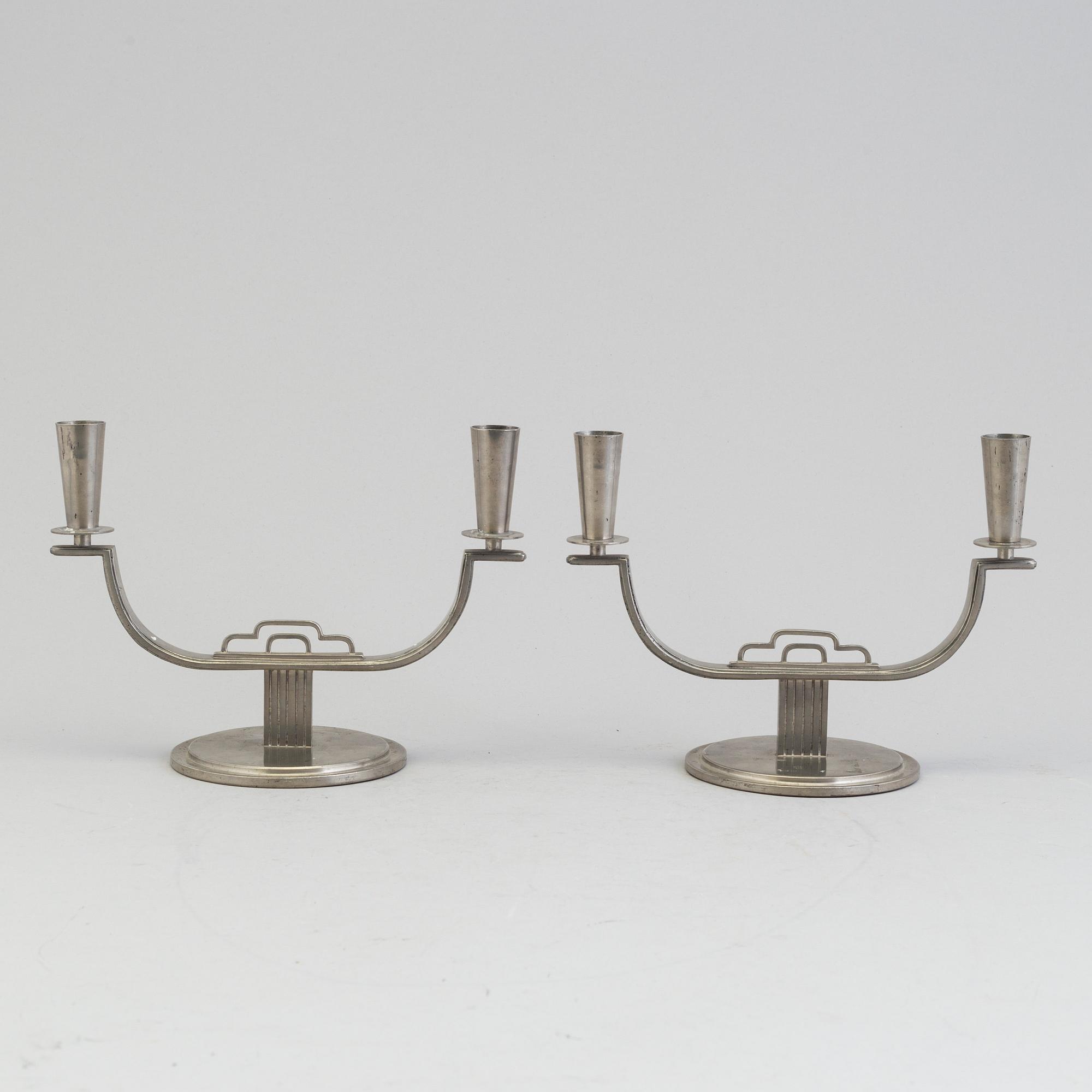 A pair of pewter candelabra by Carl Einar Borgström, Ystad Metall, marked CEB.