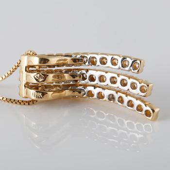 HÄNGE , 14K guld med briljantslipade diamanter ca 1.20 ct. Vikt 5,4 gram.