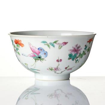 A famille rose 'butterfly' bowl, Qing dynasty with Daoguang mark and of the period (1820-1850).
