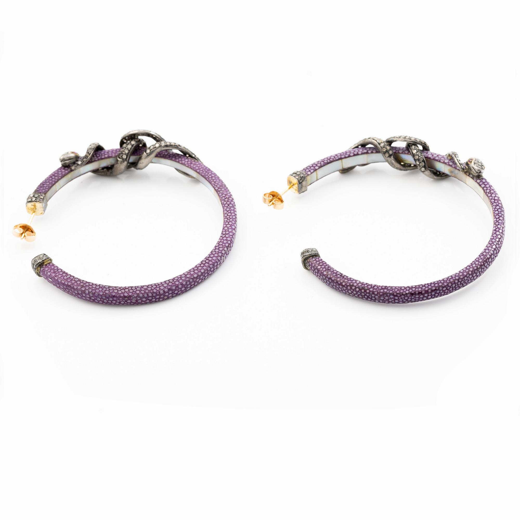 A pair of earrings in the shape of a snake, leather, mother-of-pearl and silver, with  diamonds in various cuts.