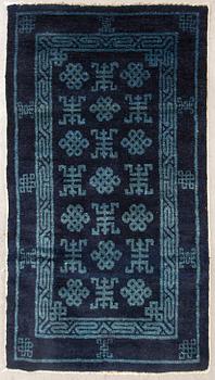 A semiantique Chinese Baotou carpet ca 114x64 cm.