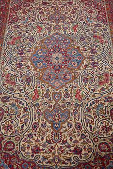 Matto, a semi-antique silk Kashan, ca 212,5-214,5 x 134,5-135,5 cm.