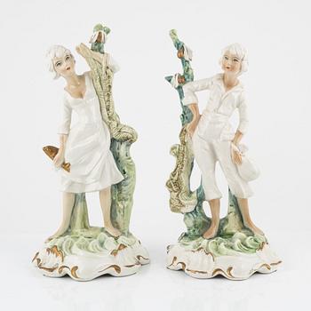 Capodimonte, a pair of creamware figurines, Italy mid 20th century.