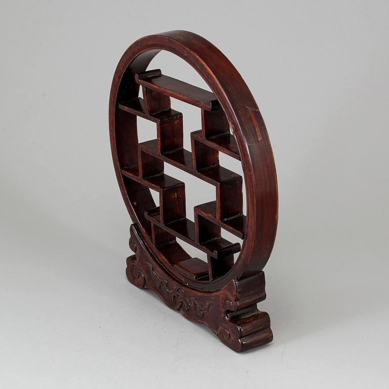 A chinese wooden stand for miniatyres, early 20th Century.