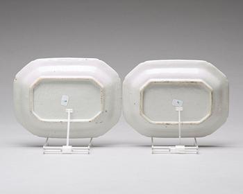 A pair of famille rose 'double peacock' butter tureens with covers and stands, Qing dynasty, Qianlong (1736-95).