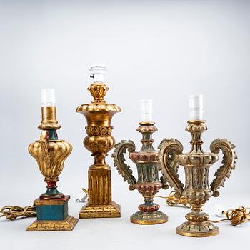 Four mid 20th century wood table lamps from Paoletti, Firenze Italy.