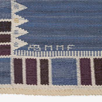 Barbro Nilsson, a carpet, 'Salerno blå med enkel bård', flat weave, c. 365 x 244 cm, signed AB MMF BN.