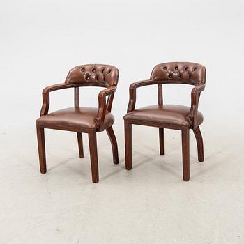 A pair of leather armchairs from the second half of the 20th century.