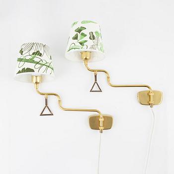 A pair of brass wall lights,  second half of the 20th century.