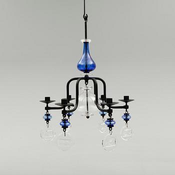 LJUSKRONA, smide och glas, Erik Höglund, 1900-talets andra hälft. Höjd ca 60 cm.