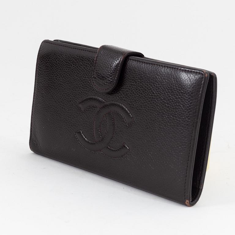 Chanel, a chocolate brown caviar leather wallet.