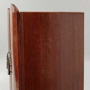 A cabinet from the first half of the 20th century.