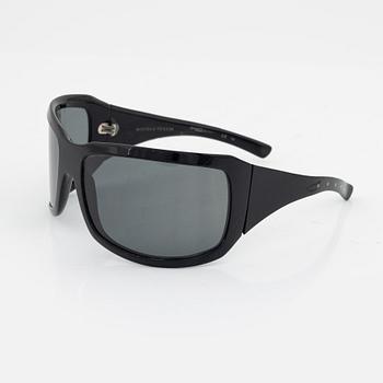 Bottega Veneta, a pair of sunglasses.