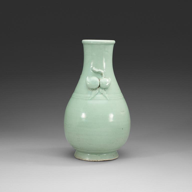 A celadon glazed vase, Qing dynasty, 18th Century.